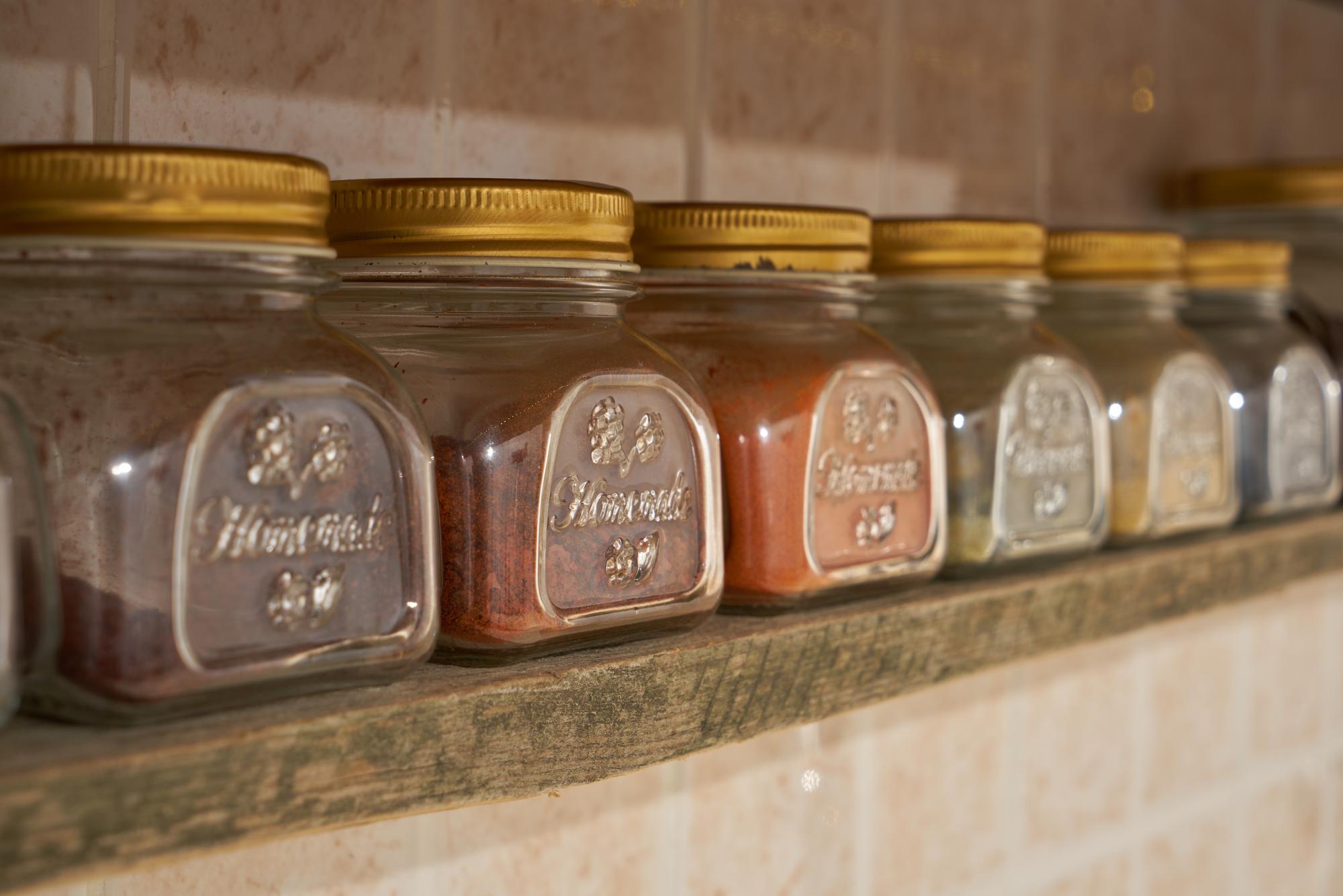 Curated pantry box with labeled jars and card